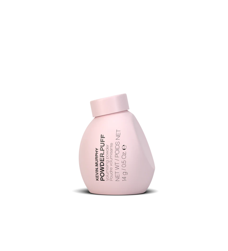 A bottle of **KEVIN.MURPHY POWDER.PUFF**, a lightweight volumising powder designed to add instant lift and texture to all hair types. This unique formula transforms into a weightless product that creates effortless volume and a matte finish for a lived-in, natural look.