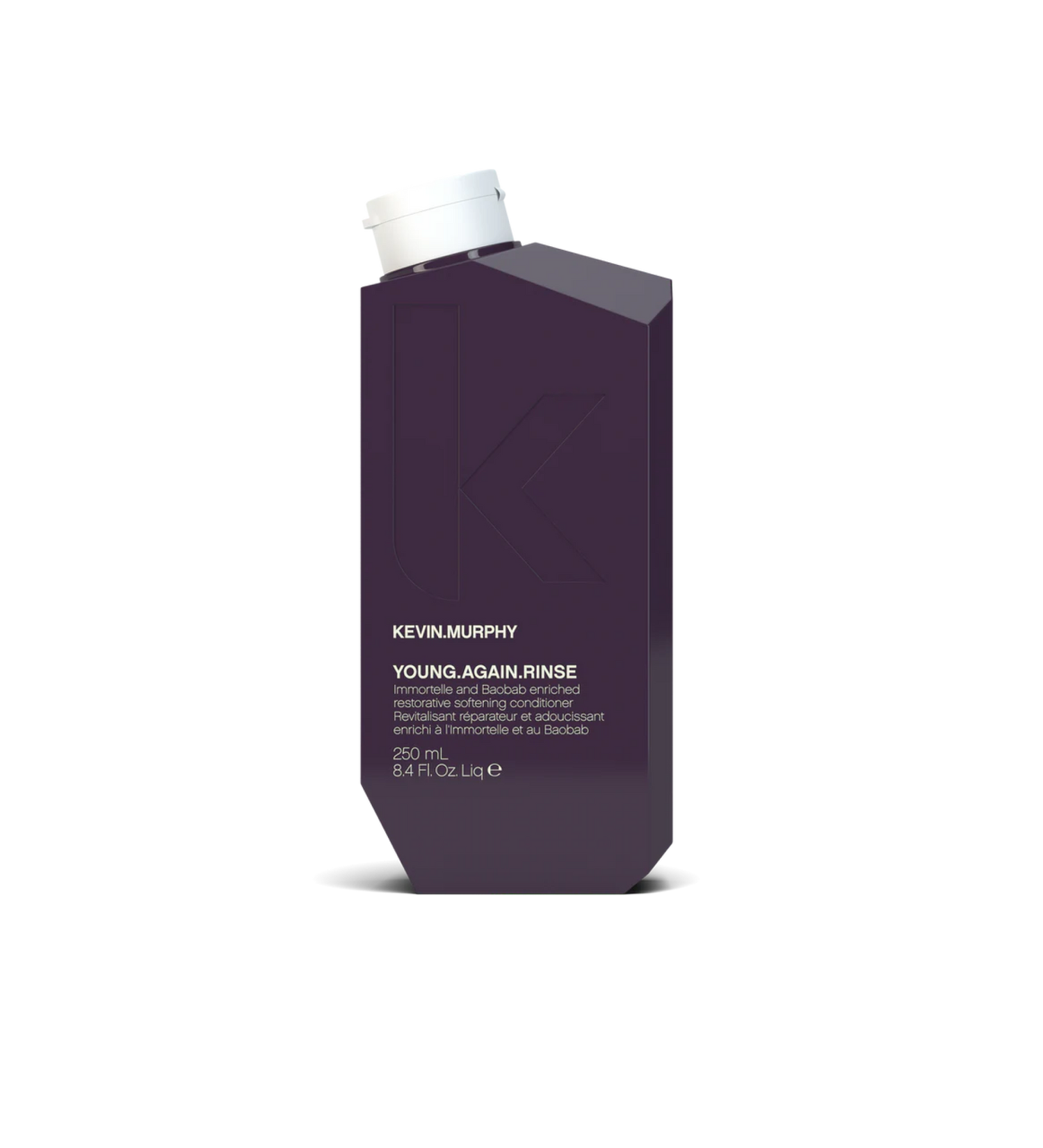 A bottle of **KEVIN.MURPHY YOUNG.AGAIN.RINSE**, a luxurious, antioxidant-rich conditioner designed to restore moisture, strength, and shine to dry, brittle, or aging hair. Infused with nourishing ingredients like immortelle and baobab seed oil, this lightweight formula helps smooth frizz, improve elasticity, and protect against daily environmental stressors.