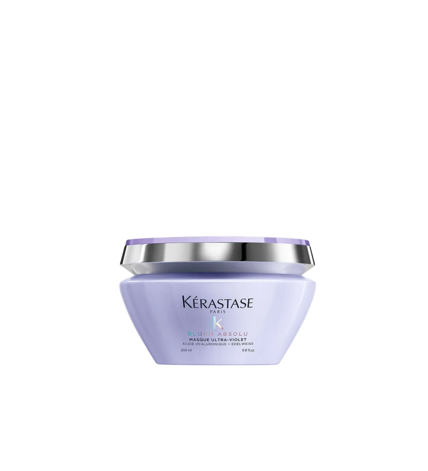 A jar of **Kérastase Blond Absolu Masque Ultra-Violet**, a deeply nourishing purple hair mask designed to neutralize brassiness and enhance cool tones in blonde, lightened, or grey hair. Infused with hyaluronic acid and edelweiss flower, it strengthens, hydrates, and leaves hair soft, radiant, and refreshed.