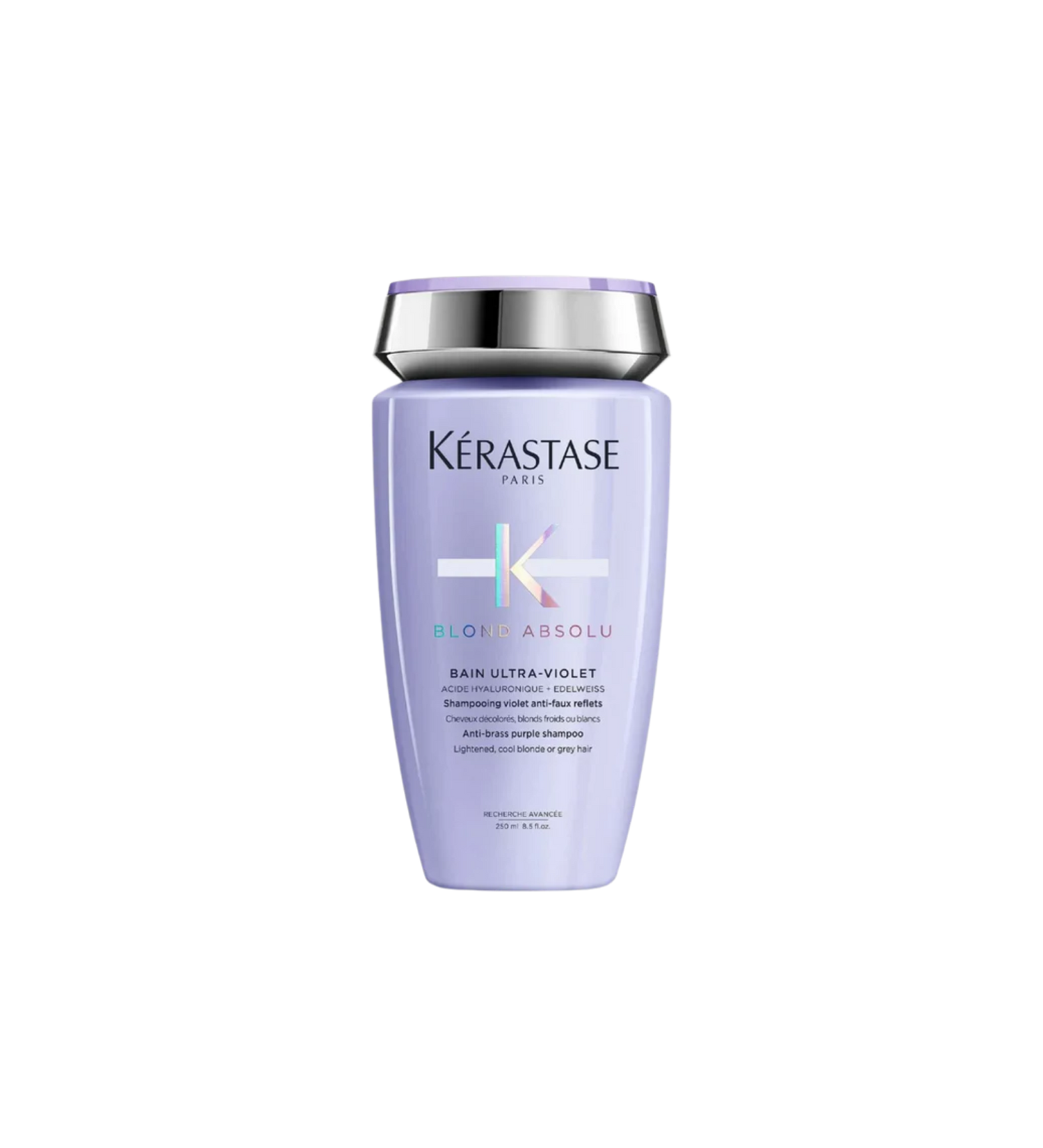 A bottle of **Kérastase Blond Absolu Bain Ultra-Violet**, a powerful purple shampoo formulated to neutralize yellow and brassy tones in blonde, lightened, or grey hair. Enriched with hyaluronic acid and edelweiss flower, it gently cleanses while strengthening and hydrating for a cooler, brighter blonde.