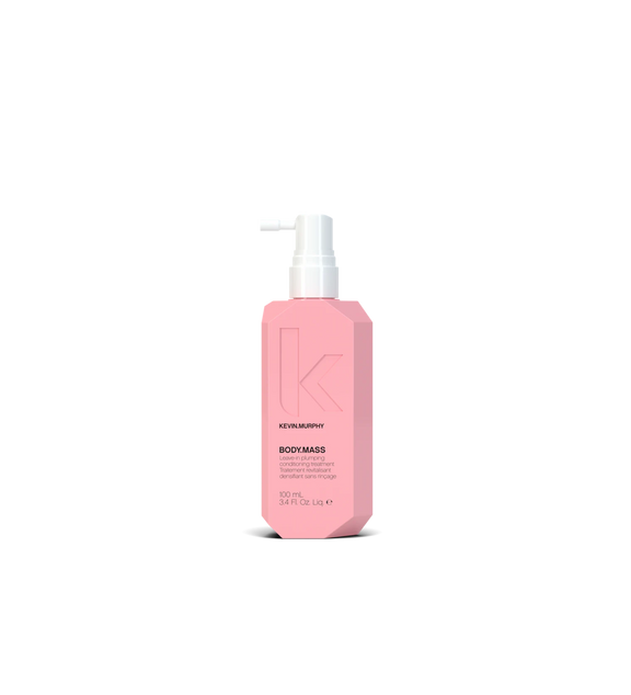 A bottle of **KEVIN.MURPHY BODY.MASS**, a leave-in plumping treatment designed to thicken and strengthen hair while reducing breakage. The sleek, matte lavender packaging highlights its lightweight, densifying formula, perfect for adding volume and fullness to fine or thinning hair.