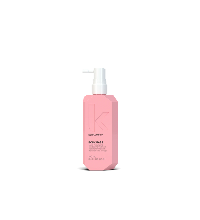 A bottle of **KEVIN.MURPHY BODY.MASS**, a leave-in plumping treatment designed to thicken and strengthen hair while reducing breakage. The sleek, matte lavender packaging highlights its lightweight, densifying formula, perfect for adding volume and fullness to fine or thinning hair.