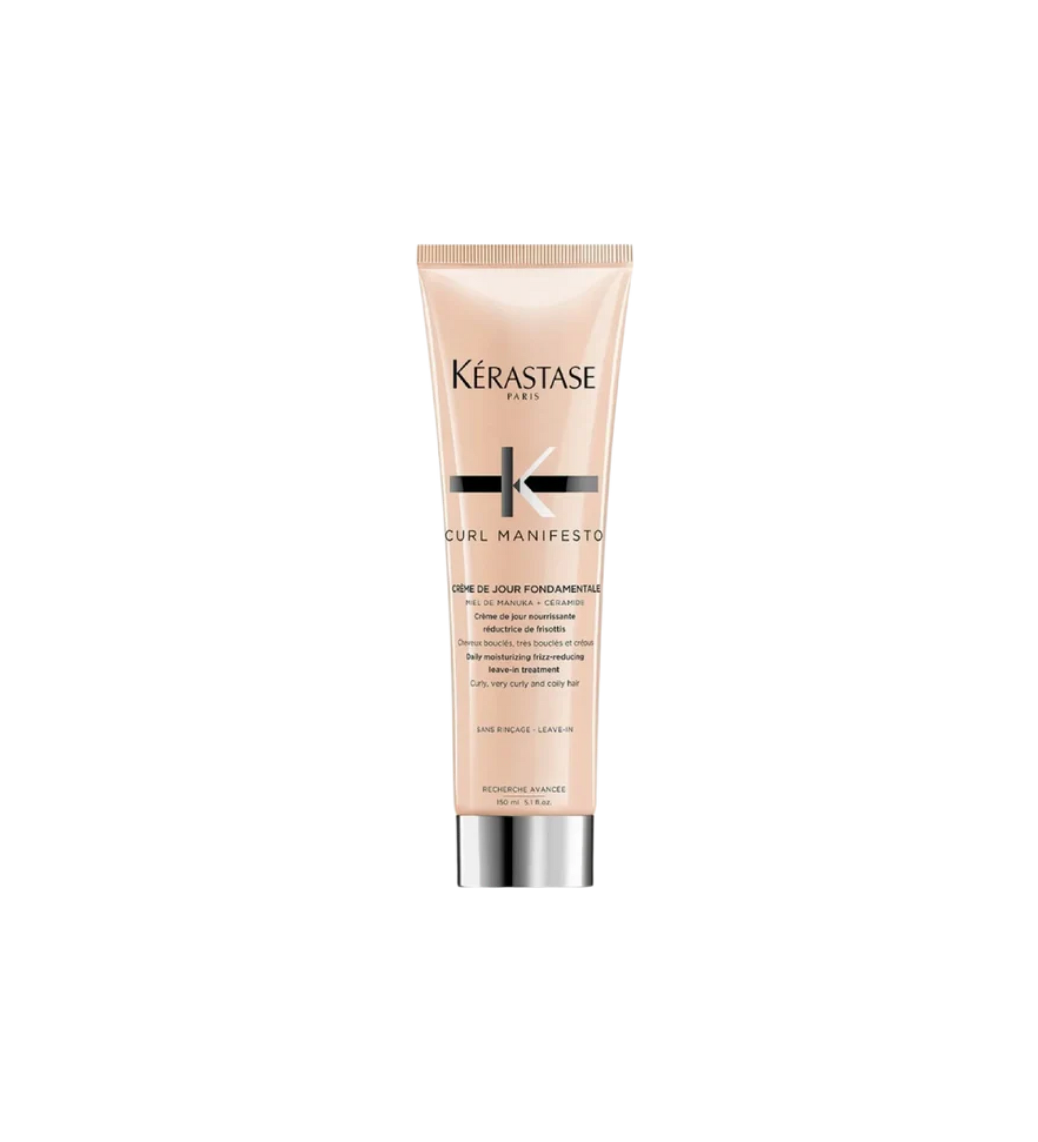 A bottle of **Kérastase Curl Manifesto Crème De Jour Fondamentale**, a lightweight, leave-in anti-frizz cream designed to nourish and protect curly, very curly, and coily hair. Enriched with Manuka honey and ceramides, it provides intense hydration, enhances curl definition, and offers heat protection while reducing frizz for smooth, bouncy curls.