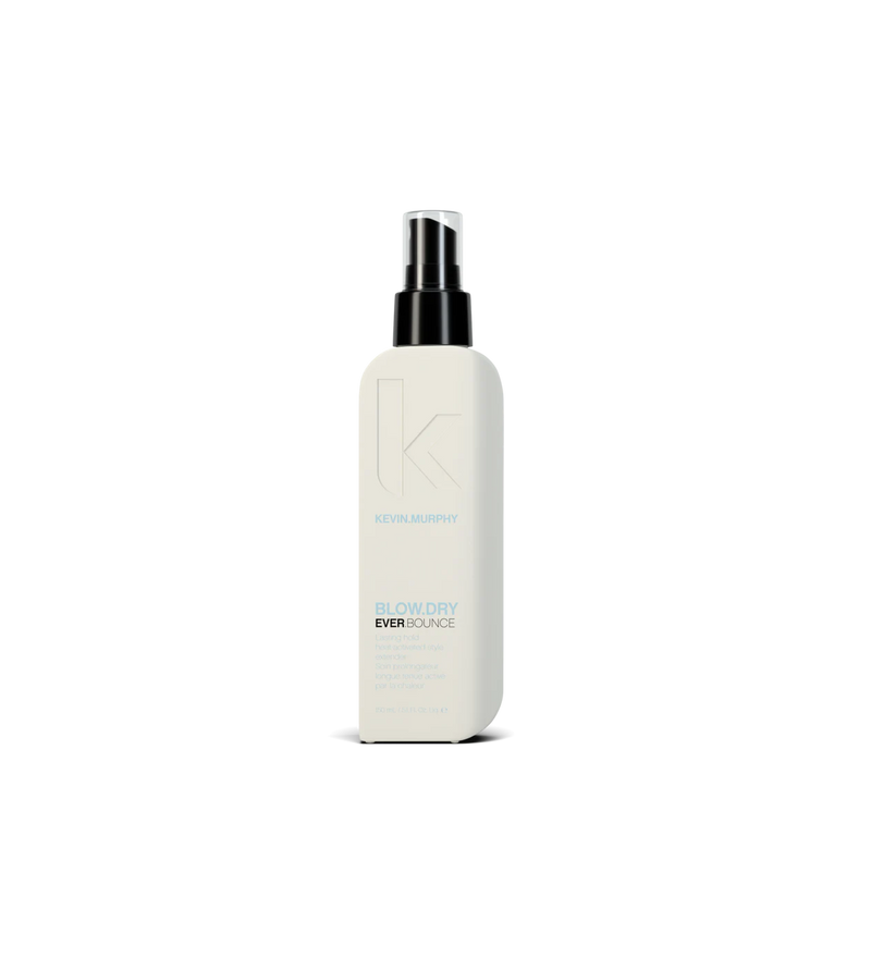 A can of **KEVIN.MURPHY EVER.BOUNCE**, a heat-activated styling spray designed to create bouncy, long-lasting curls and waves. The sleek, matte mint-green packaging highlights its lightweight formula, enhancing movement, shine, and frizz control for a polished, voluminous finish.