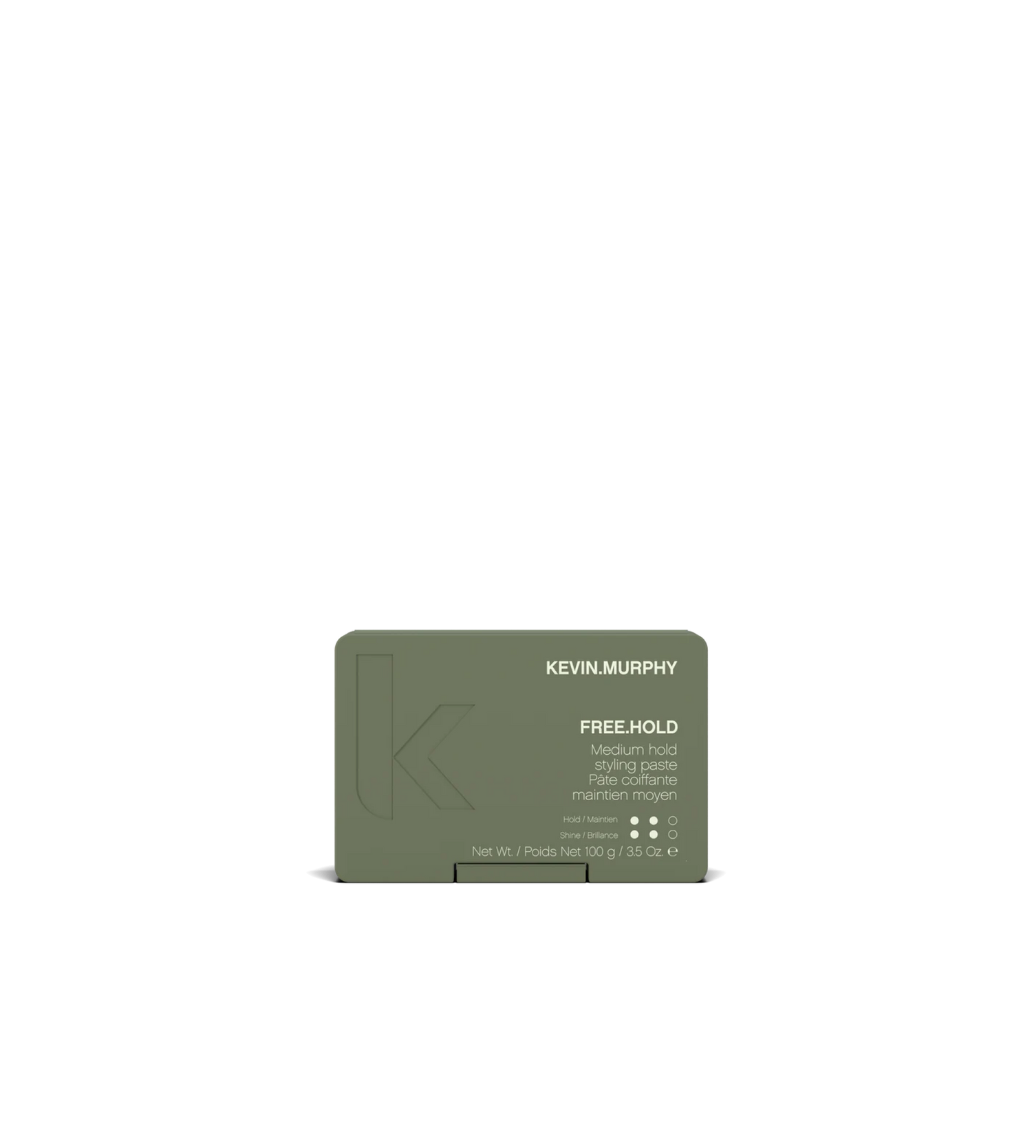 A jar of **KEVIN.MURPHY FREE.HOLD**, a medium-hold styling paste that adds natural shine and flexible control. The deep green packaging highlights its nourishing formula, enriched with antioxidants and essential oils for a healthy, conditioned finish.
