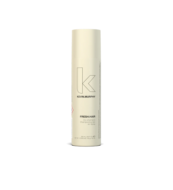 A can of **KEVIN.MURPHY FRESH.HAIR**, a revitalising dry shampoo that absorbs excess oil, removes odours, and adds volume for a freshly washed look. The sleek, matte white packaging reflects its lightweight formula, perfect for refreshing hair on the go.