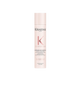 A bottle of **Kérastase FRESH AFFAIR Dry Shampoo**, a lightweight, fine-fragrance dry shampoo that instantly absorbs excess oil and refreshes hair between washes. The sleek, pastel pink packaging highlights its ultra-fine formula, infused with Vitamin E and a long-lasting neroli scent for a fresh, clean feel without residue.