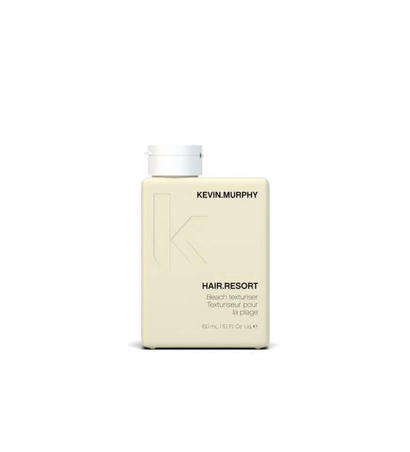 A bottle of **KEVIN.MURPHY HAIR.RESORT**, a texturizing lotion that adds volume, grit, and a beachy, tousled finish. The sleek, matte yellow packaging reflects its lightweight, flexible hold—perfect for creating effortless, sun-kissed waves.