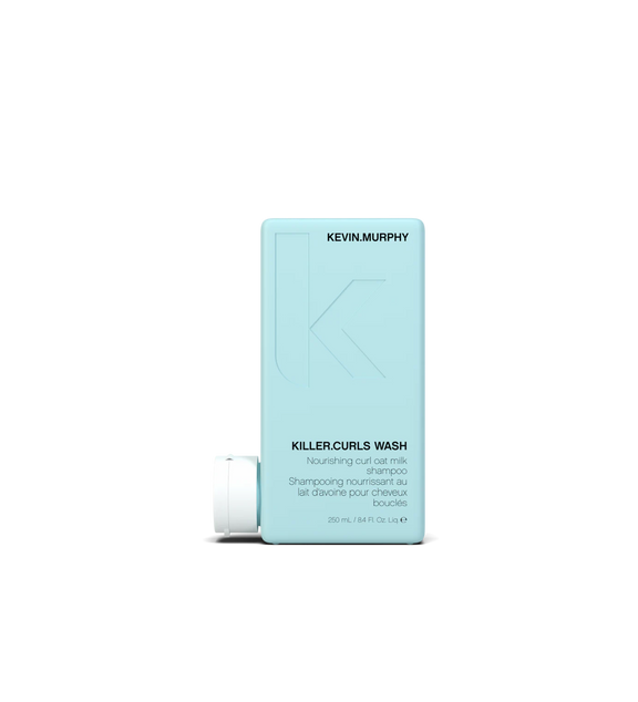A bottle of **KEVIN.MURPHY KILLER.CURLS WASH**, a hydrating and curl-enhancing shampoo designed to gently cleanse while nourishing and defining curls. Infused with natural ingredients like shea butter and oat milk to boost moisture, reduce frizz, and promote soft, bouncy curls.