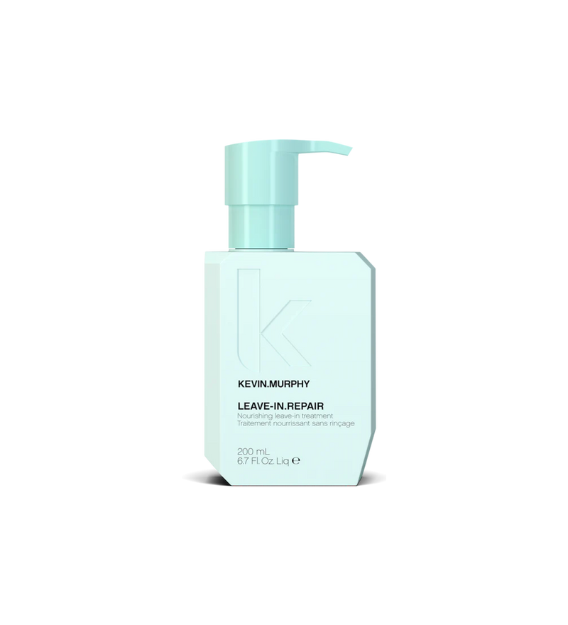 A bottle of **KEVIN.MURPHY LEAVE-IN.REPAIR**, a nourishing leave-in treatment designed to repair and strengthen damaged or over-processed hair. Infused with proteins and amino acids, it helps reduce breakage, restore moisture, and protect against heat styling—leaving hair smooth, healthy, and resilient.