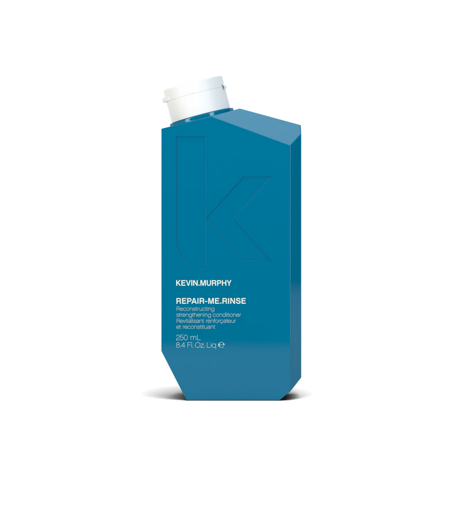 A bottle of **KEVIN.MURPHY REPAIR-ME.RINSE**, a strengthening and restorative conditioner formulated to nourish and repair damaged, brittle, or over-processed hair. Enriched with powerful proteins and amino acids, it helps rebuild and smooth hair while adding hydration, softness, and shine.