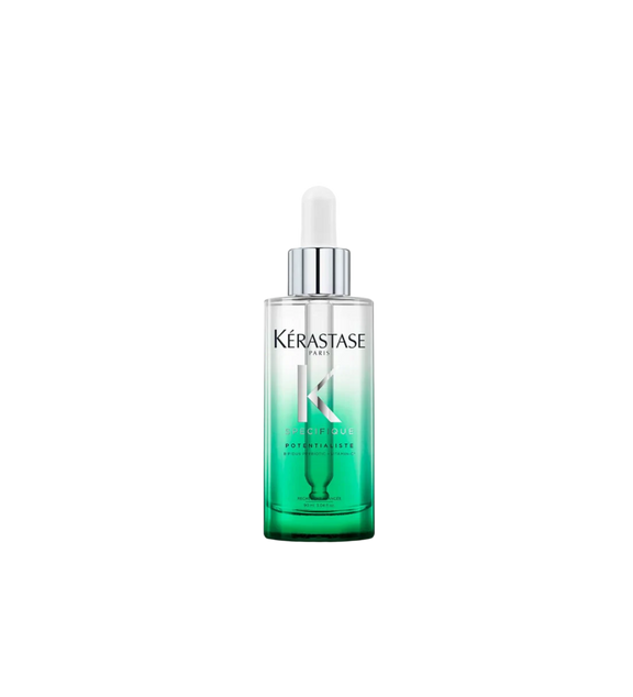 A bottle of **Kérastase Spécifique Sérum Potentialiste**, a balancing Vitamin C-enriched hair and scalp serum. Designed to strengthen the scalp’s protective barrier, it helps soothe sensitivity, reduce irritation, and maintain a healthy microbiome for stronger, more resilient hair.
