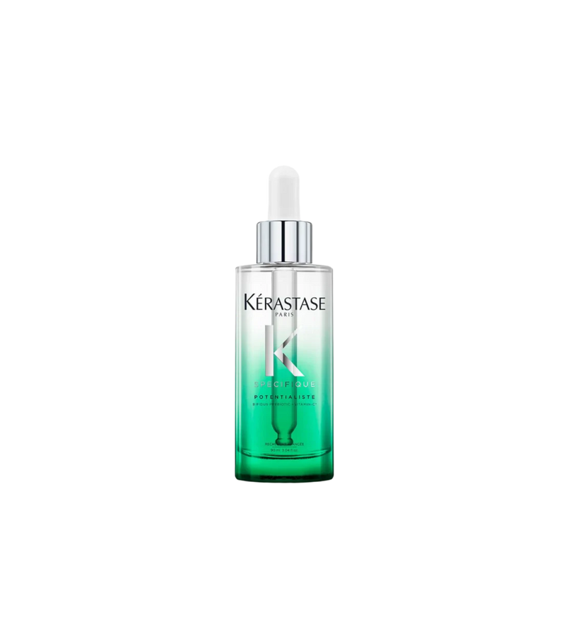 A bottle of **Kérastase Spécifique Sérum Potentialiste**, a balancing Vitamin C-enriched hair and scalp serum. Designed to strengthen the scalp’s protective barrier, it helps soothe sensitivity, reduce irritation, and maintain a healthy microbiome for stronger, more resilient hair.