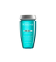 A bottle of **Kérastase Spécifique Bain Vital Dermo-Calm Shampoo**, a gentle, soothing formula designed for sensitive scalps. Infused with calming ingredients, it cleanses while reducing scalp discomfort, irritation, and dryness, leaving hair feeling fresh, light, and hydrated.