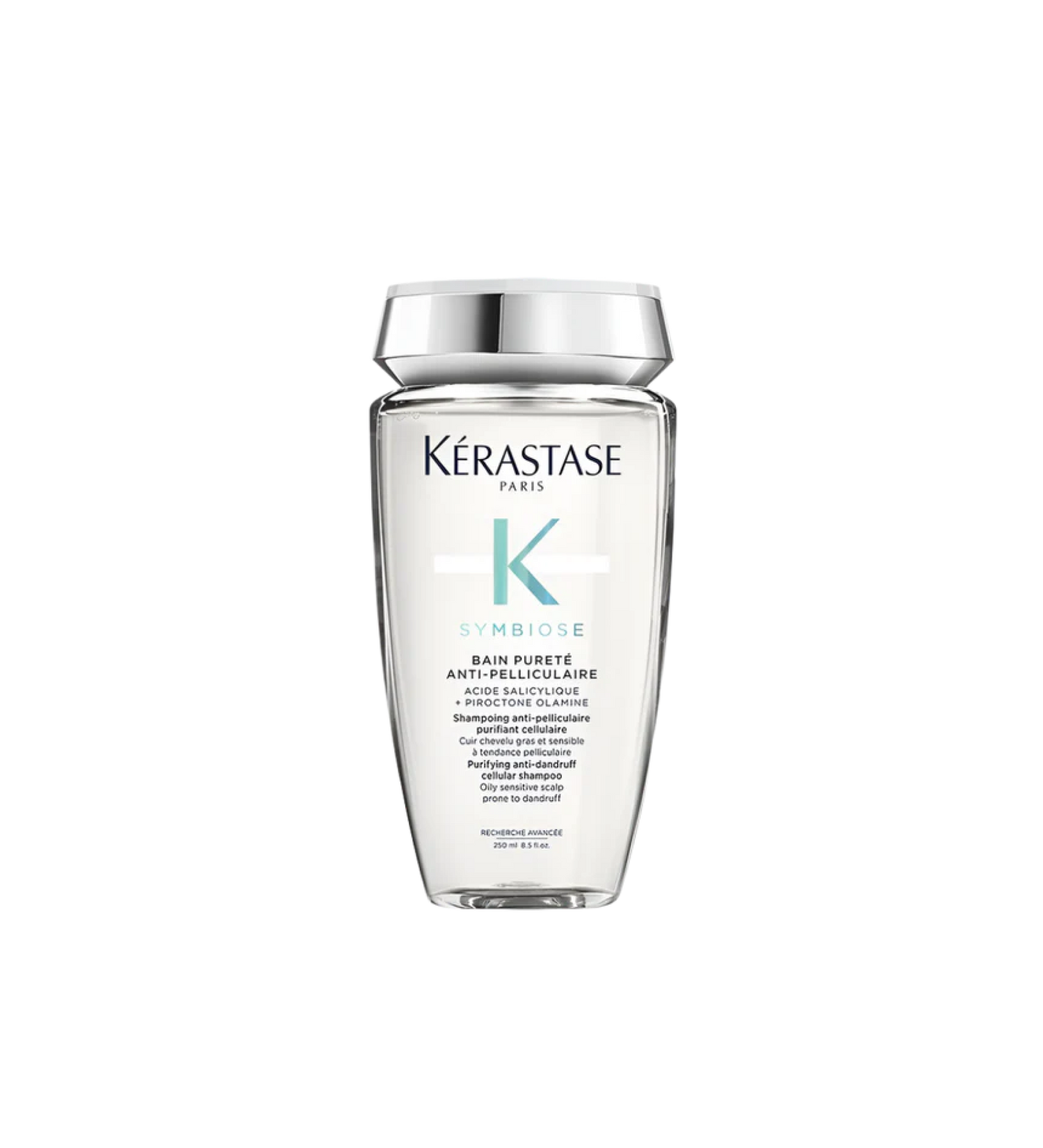 A bottle of **KERASTASE SYMBIOSE PURETÉ ANTI-DANDRUFF SHAMPOO FOR OILY SCALP**, a purifying shampoo designed to combat dandruff while balancing excess oil on the scalp. Its gentle formula cleanses deeply, removes flakes, and helps restore scalp health, leaving hair refreshed, light, and free from buildup. Perfect for those with oily scalps who want a fresh, clean feeling without dryness.