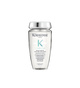 A bottle of **KERASTASE SYMBIOSE PURETÉ ANTI-DANDRUFF SHAMPOO FOR OILY SCALP**, a purifying shampoo designed to combat dandruff while balancing excess oil on the scalp. Its gentle formula cleanses deeply, removes flakes, and helps restore scalp health, leaving hair refreshed, light, and free from buildup. Perfect for those with oily scalps who want a fresh, clean feeling without dryness.