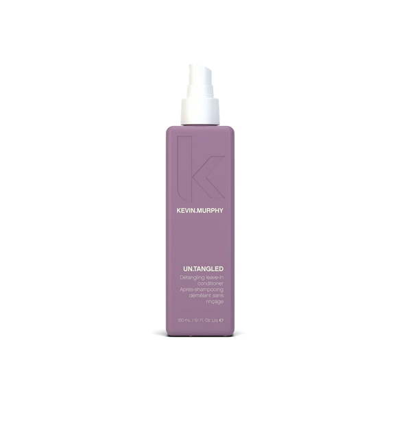 A bottle of **KEVIN.MURPHY UN.TANGLED**, a nourishing leave-in conditioner designed to gently detangle and strengthen hair while providing heat protection. Enriched with Australian fruit extracts, it hydrates, smooths, and protects against damage, leaving hair soft, manageable, and ready to style.