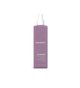 A bottle of **KEVIN.MURPHY UN.TANGLED**, a nourishing leave-in conditioner designed to gently detangle and strengthen hair while providing heat protection. Enriched with Australian fruit extracts, it hydrates, smooths, and protects against damage, leaving hair soft, manageable, and ready to style.