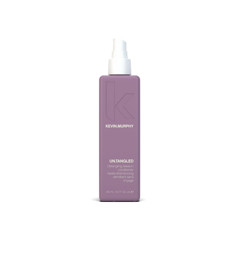 A bottle of **KEVIN.MURPHY UN.TANGLED**, a nourishing leave-in conditioner designed to gently detangle and strengthen hair while providing heat protection. Enriched with Australian fruit extracts, it hydrates, smooths, and protects against damage, leaving hair soft, manageable, and ready to style.