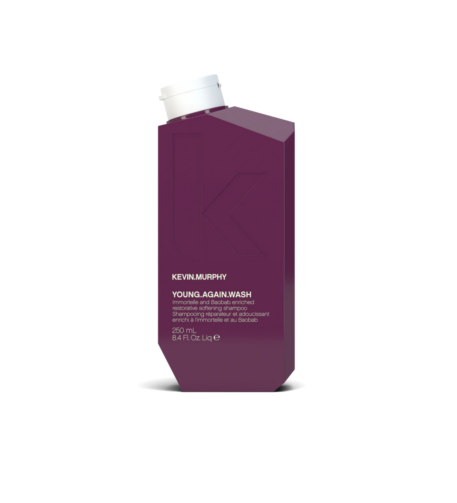 A bottle of **KEVIN.MURPHY YOUNG.AGAIN.WASH**, a nourishing shampoo infused with antioxidants and anti-aging ingredients to restore dry, brittle, or damaged hair. Designed to gently cleanse while replenishing moisture and strength, it helps protect against environmental stressors, leaving hair soft, smooth, and revitalized.