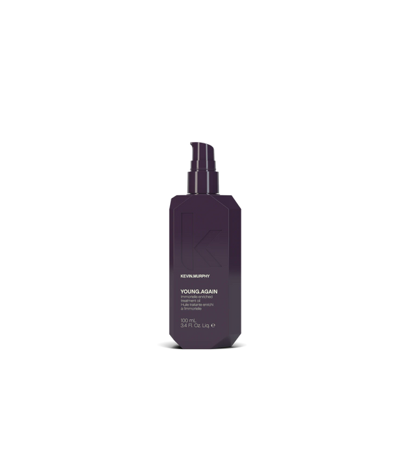 A bottle of **KEVIN.MURPHY YOUNG.AGAIN**, a weightless, leave-in treatment oil infused with antioxidants to restore softness, strength, and shine to dry, damaged, or aging hair. Formulated with immortelle and burdock root extract, it helps protect against heat damage and environmental stressors while nourishing and smoothing for a youthful, healthy finish.