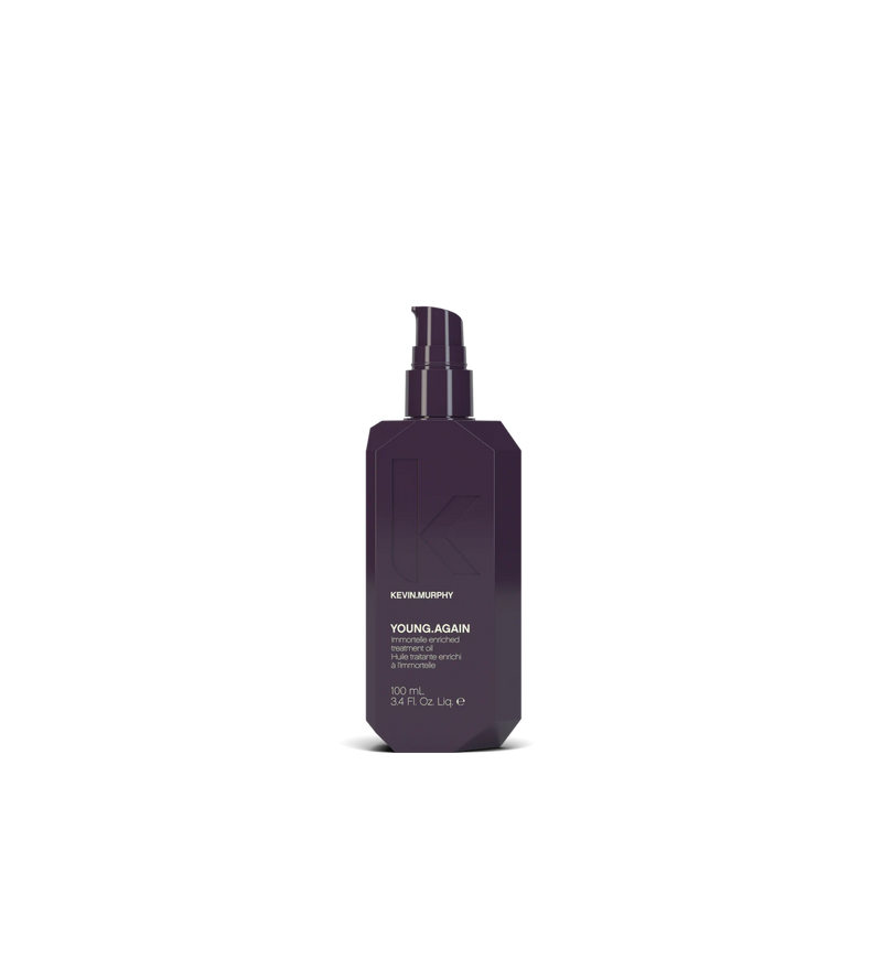 A bottle of **KEVIN.MURPHY YOUNG.AGAIN**, a weightless, leave-in treatment oil infused with antioxidants to restore softness, strength, and shine to dry, damaged, or aging hair. Formulated with immortelle and burdock root extract, it helps protect against heat damage and environmental stressors while nourishing and smoothing for a youthful, healthy finish.